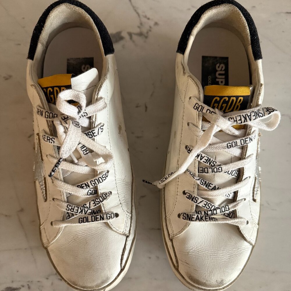 Golden GoosSuper-Star with laminated leather star and black glitter heel tab